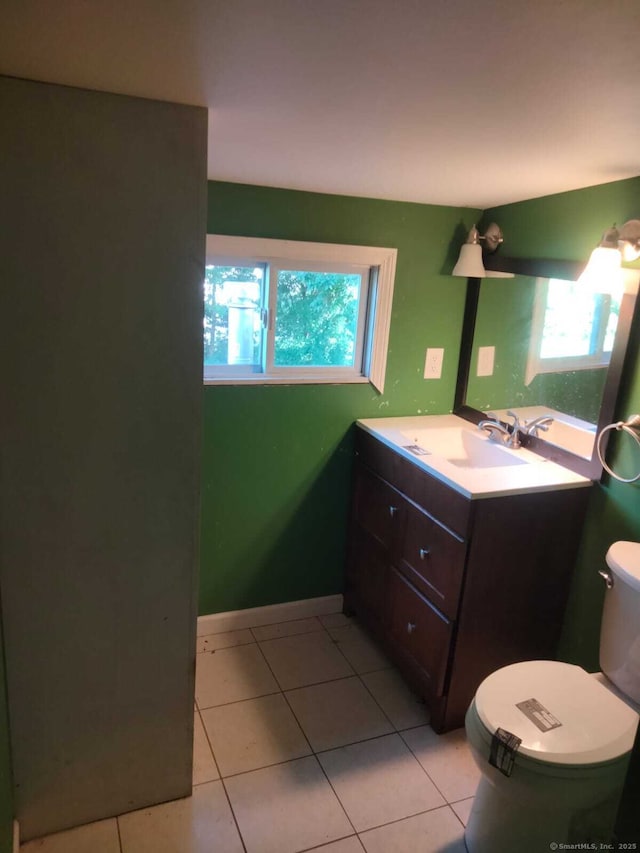 142 S Center St, Windsor Locks, CT 06096 - half bath with vanity and tile patterned flooring