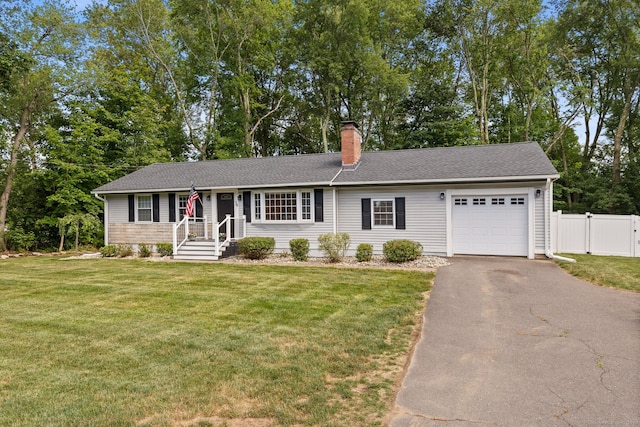 24 Wapping Wood Rd, Ellington, CT 06029 - ranch-style house featuring an attached garage, asphalt driveway, a chimney, view of scattered trees, and a gate