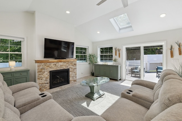 24 Wapping Wood Rd, Ellington, CT 06029 - living room with a skylight, a fireplace, healthy amount of natural light, high vaulted ceiling, and recessed lighting