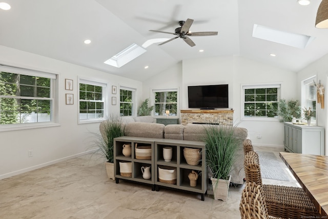 24 Wapping Wood Rd, Ellington, CT 06029 - living area featuring a skylight, ceiling fan, recessed lighting, high vaulted ceiling, and light marble finish flooring