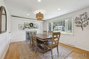24 Wapping Wood Rd, Ellington, CT 06029 - dining space featuring wood finished floors and recessed lighting