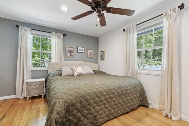 24 Wapping Wood Rd, Ellington, CT 06029 - bedroom with light wood finished floors, multiple windows, recessed lighting, and ceiling fan