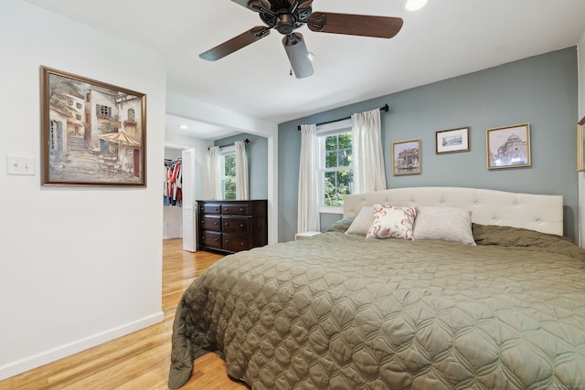 24 Wapping Wood Rd, Ellington, CT 06029 - bedroom with light wood finished floors, recessed lighting, a spacious closet, and a ceiling fan