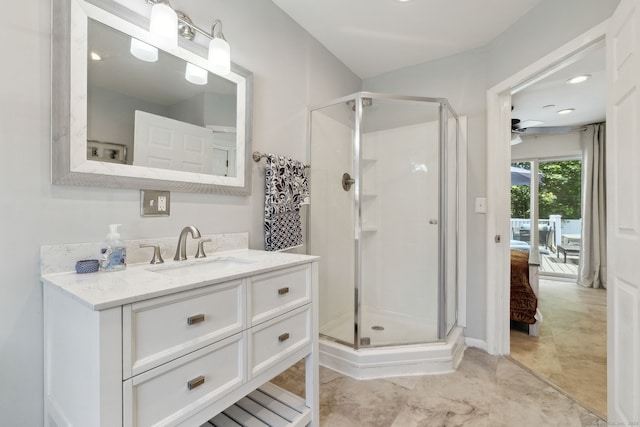 24 Wapping Wood Rd, Ellington, CT 06029 - full bath featuring a shower stall, vanity, ensuite bathroom, and a ceiling fan