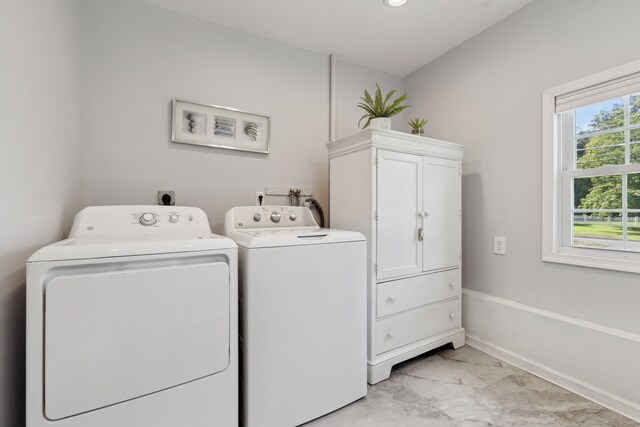 24 Wapping Wood Rd, Ellington, CT 06029 - laundry room featuring light marble finish floors, cabinet space, and separate washer and dryer