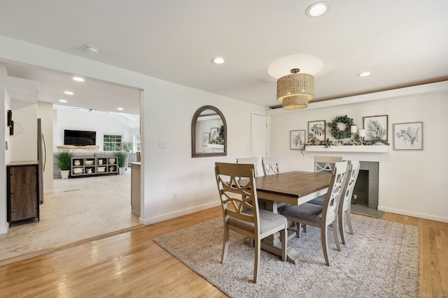 24 Wapping Wood Rd, Ellington, CT 06029 - dining room featuring light wood-style floors, recessed lighting, and a fireplace