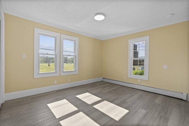 237 Helen St, Bridgeport, CT 06608 - spare room with a baseboard radiator, wood finished floors, ornamental molding, a smoke detector, and a textured ceiling