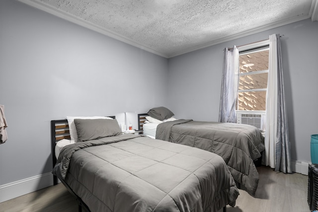 237 Helen St, Bridgeport, CT 06608 - bedroom featuring wood finished floors and a textured ceiling