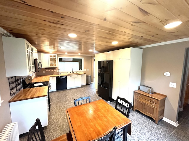 57 S Main St, East Granby, CT 06026 - dining area featuring radiator, wood ceiling, granite floors, ornamental molding, and recessed lighting