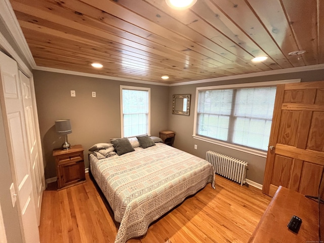 57 S Main St, East Granby, CT 06026 - bedroom featuring radiator heating unit, wooden ceiling, ornamental molding, recessed lighting, and light wood finished floors