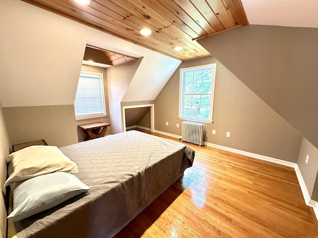 57 S Main St, East Granby, CT 06026 - bedroom featuring radiator heating unit, lofted ceiling, wood finished floors, recessed lighting, and wooden ceiling
