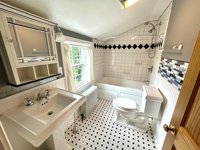 57 S Main St, East Granby, CT 06026 - full bath featuring radiator, vaulted ceiling,  shower combination, and a textured ceiling