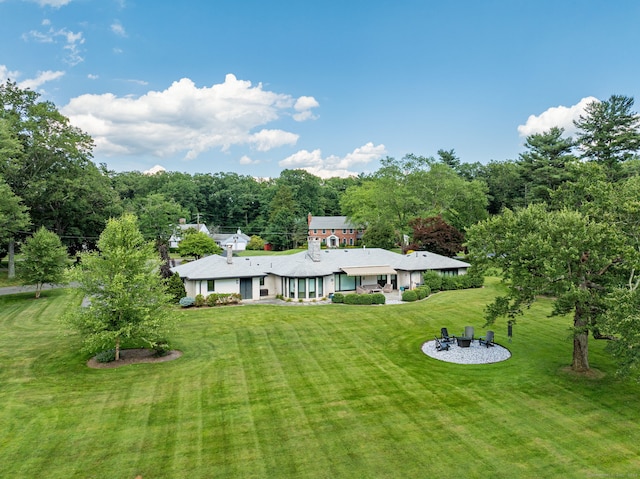 10 Prynne Ridge Rd, Longmeadow, MA 01106 - rear view of property featuring a lawn and a patio area