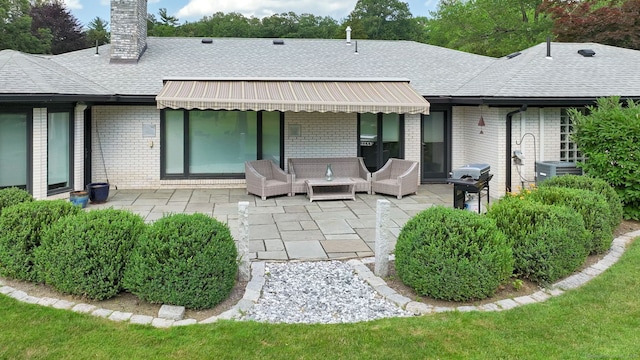 10 Prynne Ridge Rd, Longmeadow, MA 01106 - back of house featuring a patio and brick siding
