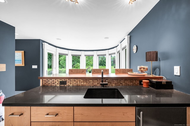 10 Prynne Ridge Rd, Longmeadow, MA 01106 - kitchen with fridge, light brown cabinets, and dark stone countertops