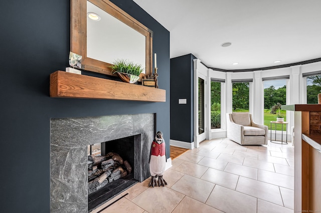 10 Prynne Ridge Rd, Longmeadow, MA 01106 - living area with a premium fireplace, tile patterned floors, and recessed lighting