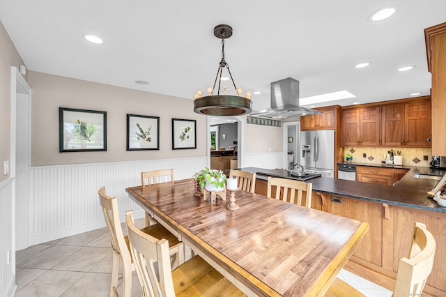 10 Prynne Ridge Rd, Longmeadow, MA 01106 - dining room featuring a wainscoted wall, light tile patterned floors, recessed lighting, and a skylight