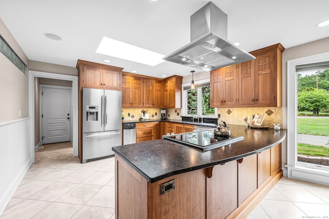 10 Prynne Ridge Rd, Longmeadow, MA 01106 - kitchen featuring stainless steel fridge with ice dispenser, island exhaust hood, a peninsula, a skylight, and black electric stovetop