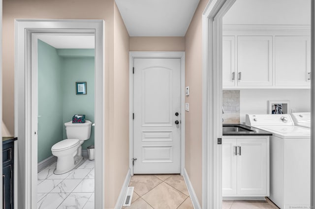 10 Prynne Ridge Rd, Longmeadow, MA 01106 - washroom with cabinet space and washer and dryer