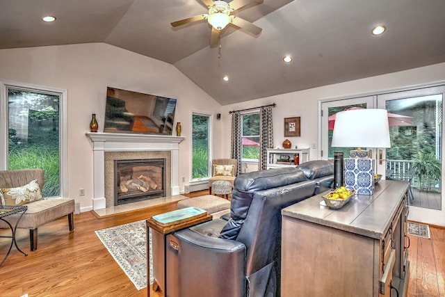 11 Sweetbriar Ln, Newtown, CT 06482 - living area featuring a fireplace with flush hearth, vaulted ceiling, ceiling fan, light wood-type flooring, and recessed lighting