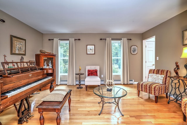 11 Sweetbriar Ln, Newtown, CT 06482 - sitting room featuring light wood-style flooring and baseboard heating