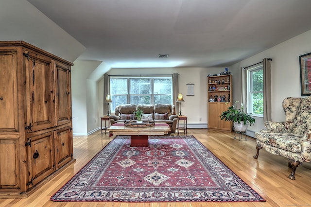 11 Sweetbriar Ln, Newtown, CT 06482 - living area with light wood-type flooring and baseboard heating