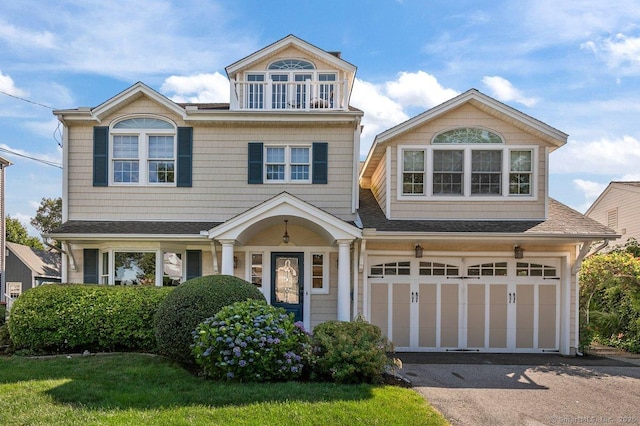 6 Tonetta Cir, Norwalk, CT 06855 - view of front of property with asphalt driveway, a garage, and roof with shingles