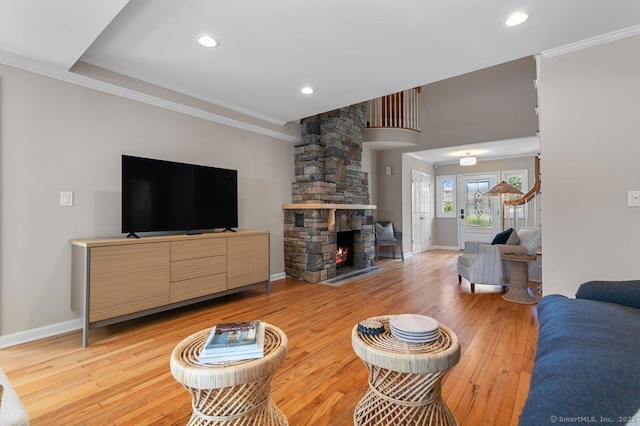 6 Tonetta Cir, Norwalk, CT 06855 - living area with light wood finished floors, crown molding, ornate columns, and recessed lighting
