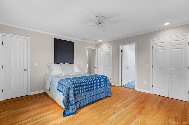 6 Tonetta Cir, Norwalk, CT 06855 - bedroom featuring multiple closets, light wood finished floors, ornamental molding, recessed lighting, and a ceiling fan
