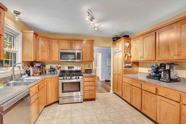 30 Lake Rd, Columbia, CT 06237 - kitchen with stainless steel appliances, light tile patterned floors, light countertops, and track lighting