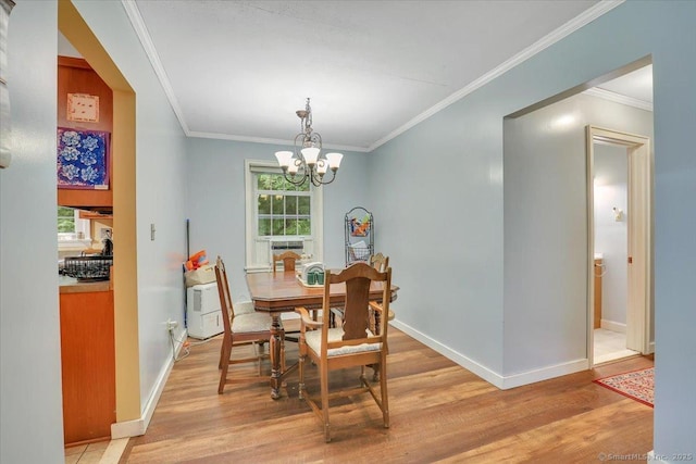30 Lake Rd, Columbia, CT 06237 - dining room featuring light wood-style floors, crown molding, and a chandelier