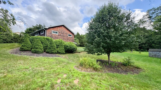 70 River Rd, Preston, CT 06365 - view of green lawn featuring an outdoor structure