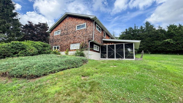 70 River Rd, Preston, CT 06365 - rear view of house featuring a sunroom and a yard