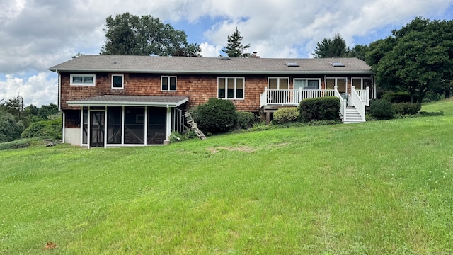 70 River Rd, Preston, CT 06365 - back of property featuring a yard, a sunroom, and a shingled roof
