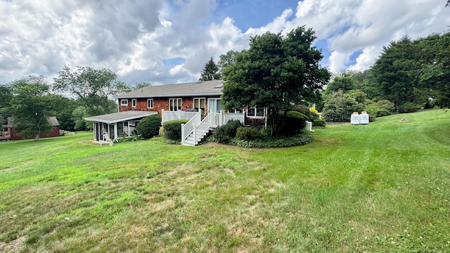70 River Rd, Preston, CT 06365 - view of grassy yard featuring a sunroom