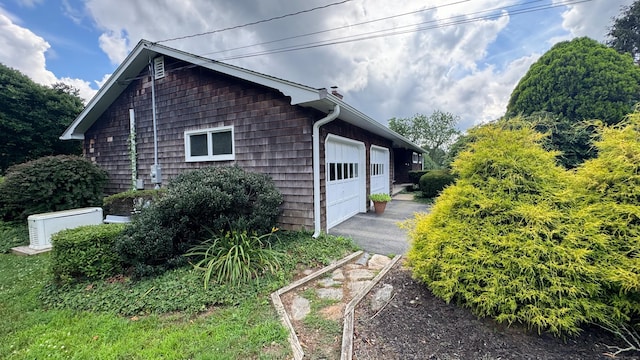 70 River Rd, Preston, CT 06365 - view of property exterior featuring a garage