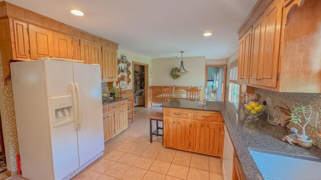 70 River Rd, Preston, CT 06365 - kitchen with white fridge with ice dispenser, light tile patterned flooring, a peninsula, decorative backsplash, and recessed lighting