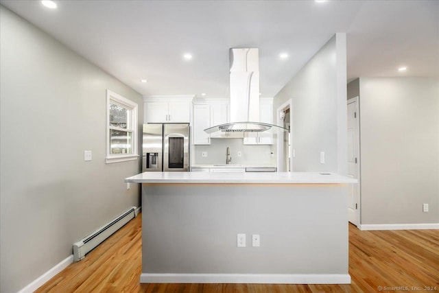 18 Greenbrier Rd, East Hartford, CT 06118 - kitchen with stainless steel refrigerator with ice dispenser, baseboard heating, premium range hood, white cabinets, and light wood-type flooring