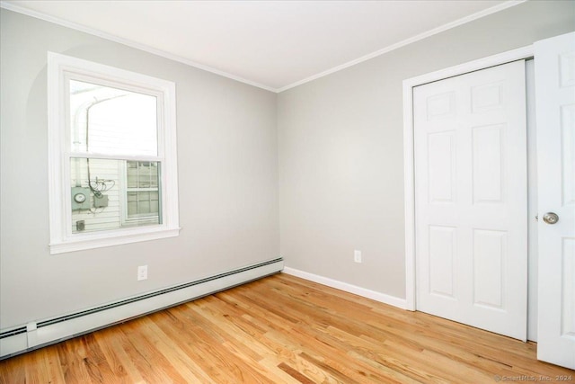 18 Greenbrier Rd, East Hartford, CT 06118 - unfurnished bedroom featuring baseboard heating, crown molding, and light wood-type flooring