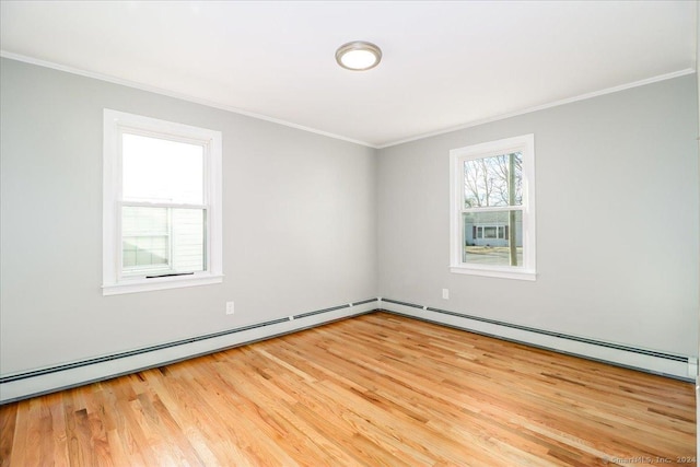 18 Greenbrier Rd, East Hartford, CT 06118 - empty room featuring crown molding, wood finished floors, and baseboard heating