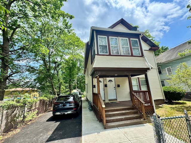393 Newhall St, New Haven, CT 06511 - view of front of house with asphalt driveway and a porch