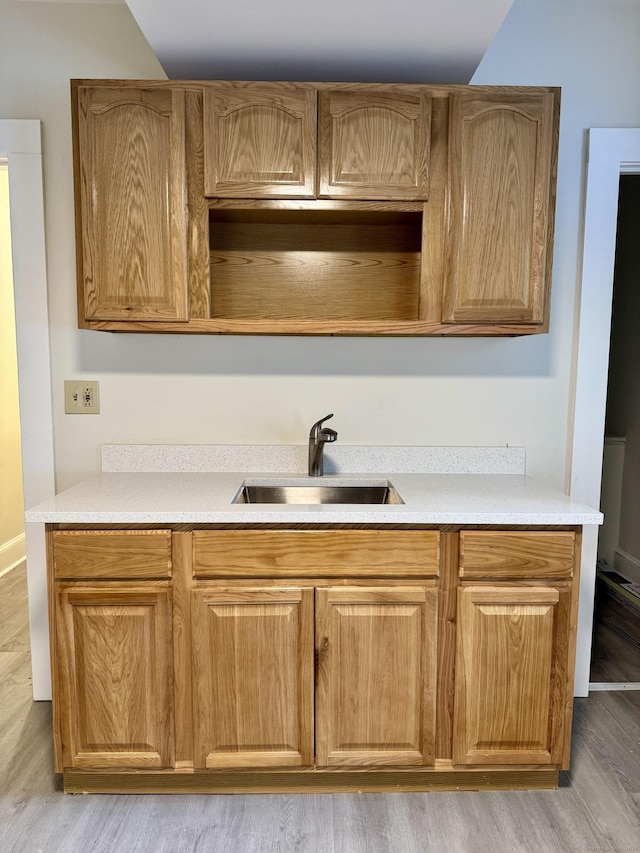 393 Newhall St, New Haven, CT 06511 - kitchen featuring light wood-style floors, light countertops, and open shelves