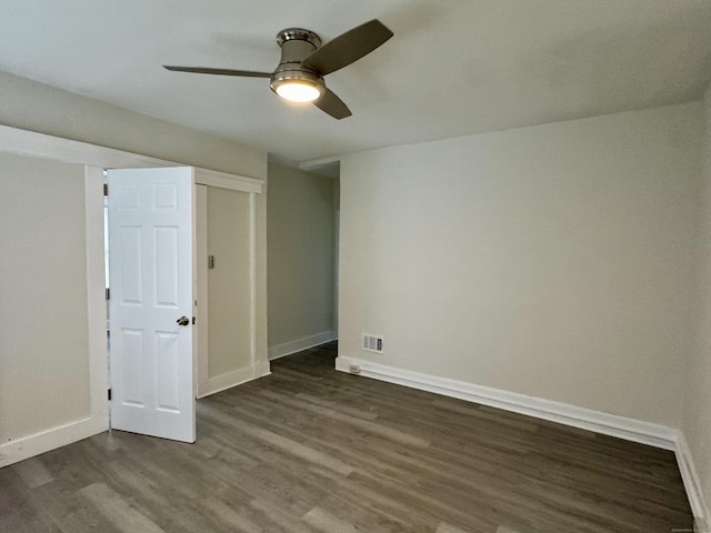 393 Newhall St, New Haven, CT 06511 - unfurnished bedroom with dark wood-style floors and a ceiling fan