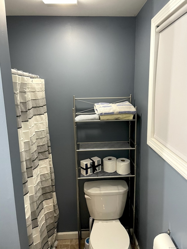 699 Main St, Watertown, CT 06779 - bathroom with toilet and a shower with curtain