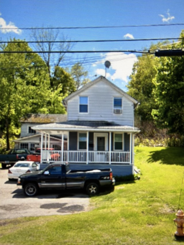 699 Main St, Watertown, CT 06779 - view of front of property featuring covered porch and a front yard