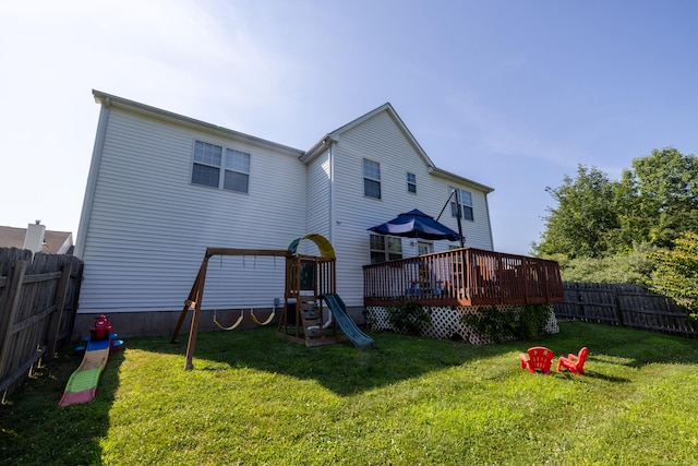 14 Greenview Ter, Middletown, CT 06457 - rear view of house featuring a deck, a fenced backyard, and a playground