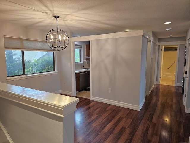 29 Great Meadow Ln Unit 29, Farmington, CT 06001 - hallway featuring a chandelier, dark wood-style floors, recessed lighting, and a textured ceiling