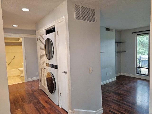 29 Great Meadow Ln Unit 29, Farmington, CT 06001 - laundry area with stacked washer / dryer, dark wood-style floors, and recessed lighting