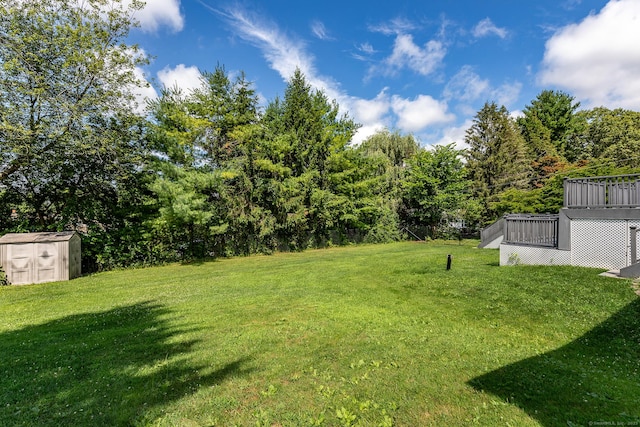 21 Brentwood Rd, New Milford, CT 06776 - view of green lawn featuring a shed and a deck