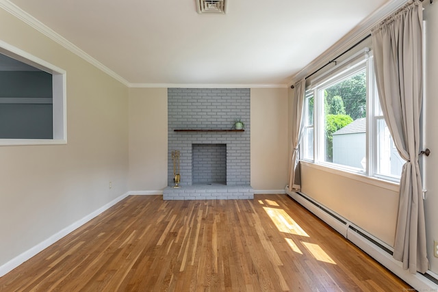 21 Brentwood Rd, New Milford, CT 06776 - unfurnished living room featuring a baseboard heating unit, wood finished floors, a fireplace, and ornamental molding